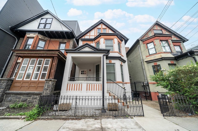 549 Palisade Ave Unit 2, Jersey City, NJ 07307 - view of front of house featuring a fenced front yard, a gate, and a porch