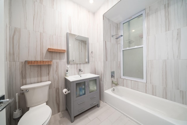 549 Palisade Ave Unit 2, Jersey City, NJ 07307 - full bathroom with tile walls, vanity, shower / bath combination, and tile patterned floors