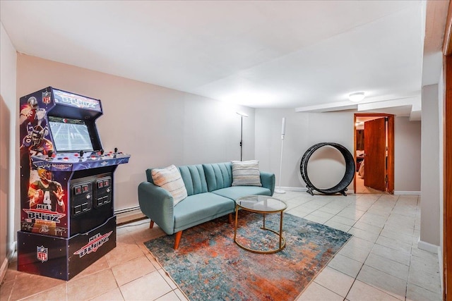 living area featuring tile patterned floors and baseboards