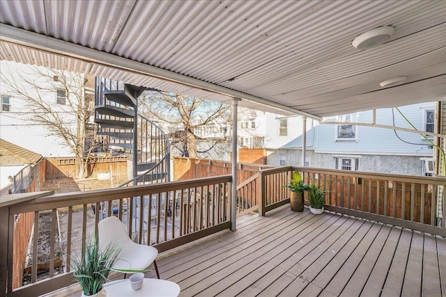 wooden terrace featuring fence