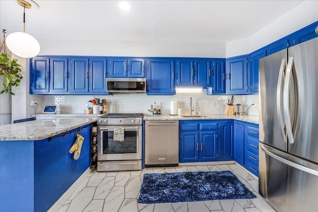 kitchen with a sink, blue cabinetry, marble finish floor, and stainless steel appliances