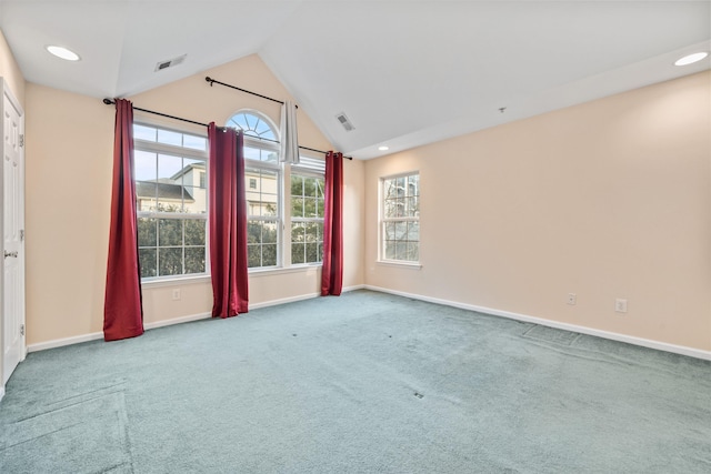 unfurnished room featuring visible vents, recessed lighting, carpet floors, baseboards, and vaulted ceiling