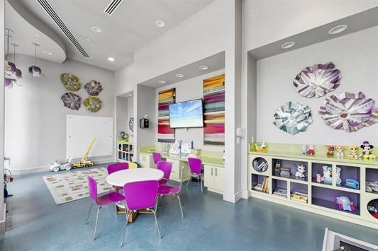 1200 Avenue At Port Imperial Unit 301, Weehawken, NJ 07086 - recreation room featuring recessed lighting, concrete flooring, and baseboards