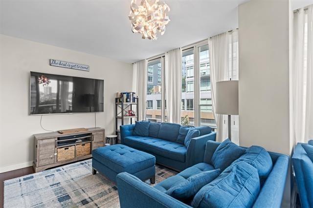 1200 Avenue At Port Imperial Unit 301, Weehawken, NJ 07086 - living area with a chandelier and baseboards