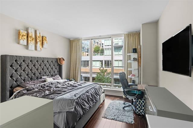 1200 Avenue At Port Imperial Unit 301, Weehawken, NJ 07086 - bedroom featuring wood finished floors and a desk