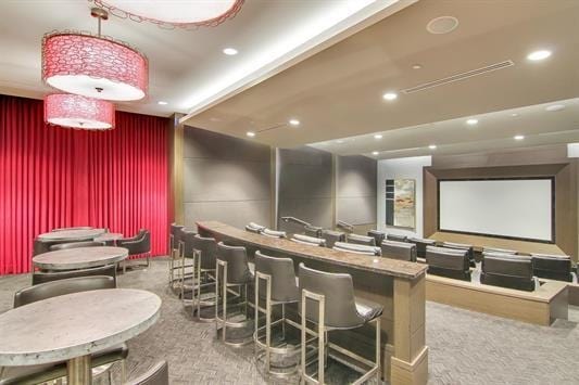 1200 Avenue At Port Imperial Unit 301, Weehawken, NJ 07086 - cinema room with carpet floors, a bar, and recessed lighting