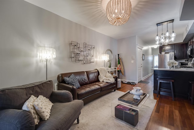 380 7th St Unit 2A, Jersey City, NJ 07302 - living room featuring a chandelier and dark wood-type flooring