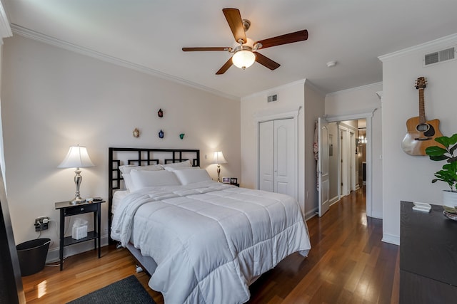 380 7th St Unit 2A, Jersey City, NJ 07302 - bedroom with a closet, ornamental molding, wood finished floors, and ceiling fan