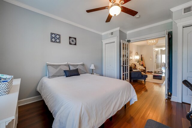 380 7th St Unit 2A, Jersey City, NJ 07302 - bedroom with wood finished floors, ornamental molding, a ceiling fan, and french doors