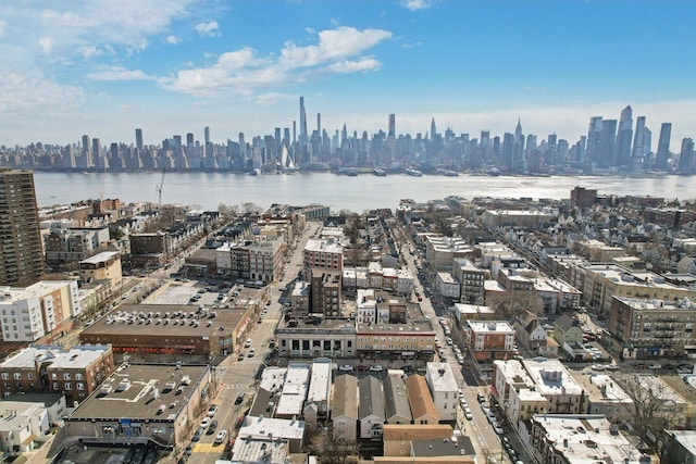 property's view of city featuring a water view