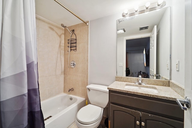 bathroom with toilet, shower / bath combo, visible vents, and vanity