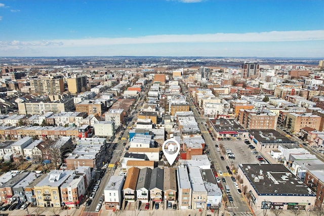 drone / aerial view featuring a city view