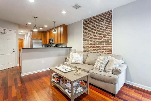 508 Grand St Unit 1L, Hoboken, NJ 07030 - living room with dark wood-type flooring, recessed lighting, and baseboards