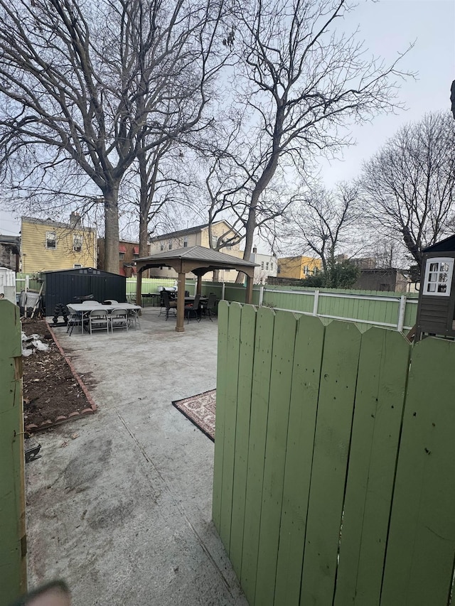 view of yard featuring a patio area, a gazebo, and outdoor lounge area