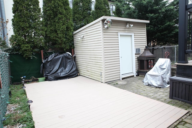 view of shed featuring a fenced backyard