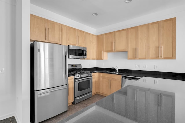 1300 Grand St Unit 521, Hoboken, NJ 07030 - kitchen featuring stainless steel appliances, a sink, light brown cabinetry, and recessed lighting