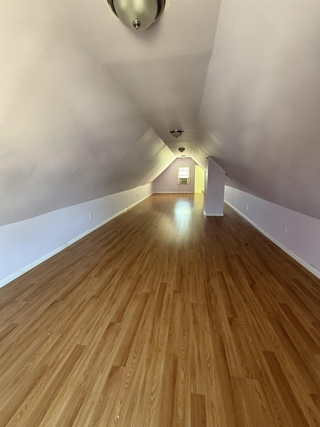 78 W 27th St, Bayonne, NJ 07002 - bonus room featuring vaulted ceiling, wood finished floors, and baseboards