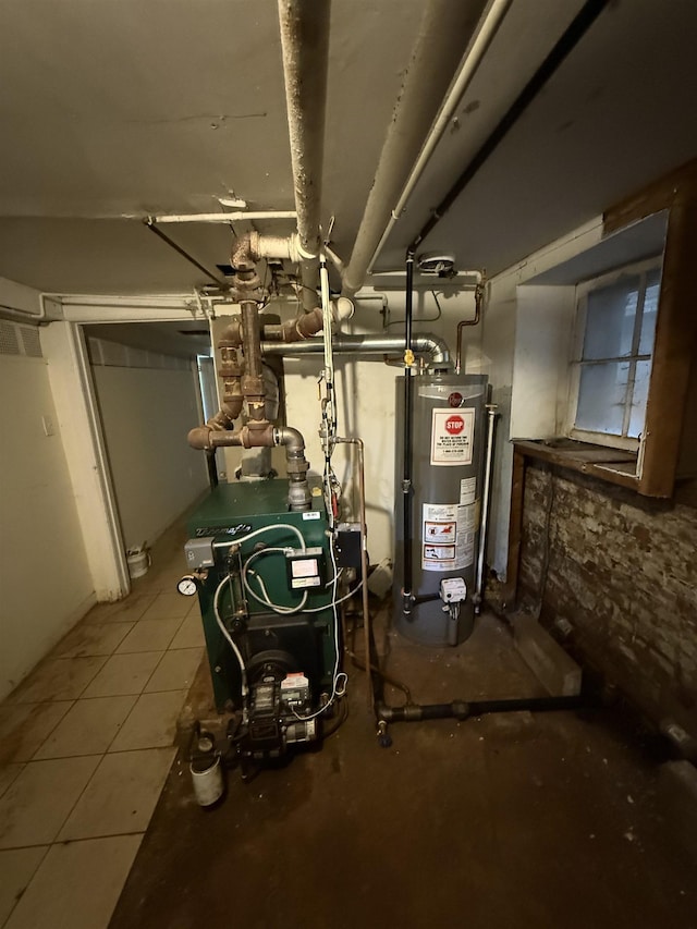 78 W 27th St, Bayonne, NJ 07002 - utility room featuring gas water heater and a heating unit