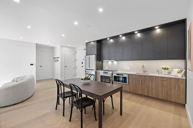 391 1st St Unit 3-B, Jersey City, NJ 07302 - dining area featuring light wood finished floors and recessed lighting