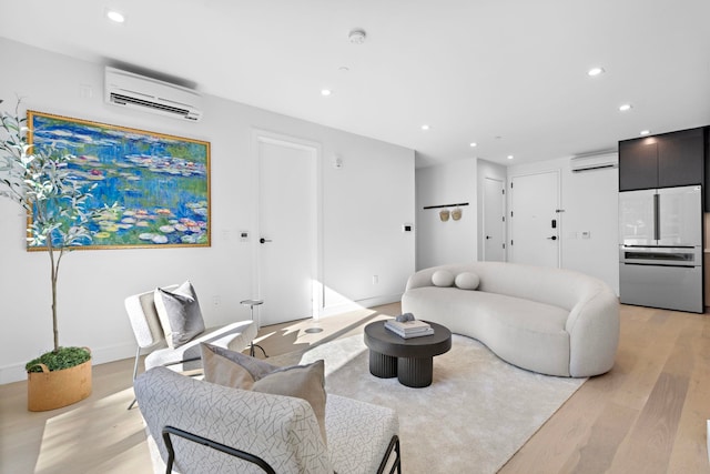 391 1st St Unit 3-B, Jersey City, NJ 07302 - living area with a wall mounted AC, light wood finished floors, and recessed lighting