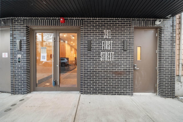 391 1st St Unit 3-B, Jersey City, NJ 07302 - view of exterior entry with brick siding