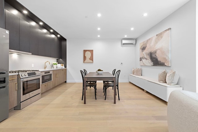 391 1st St Unit 3-B, Jersey City, NJ 07302 - dining room featuring a wall mounted air conditioner, light wood finished floors, recessed lighting, and baseboards