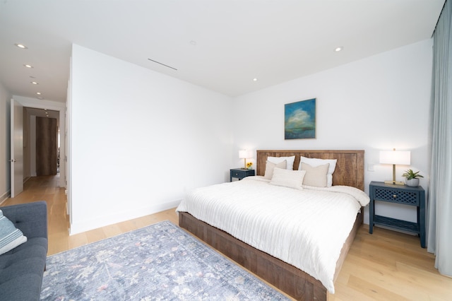 48 Coles St Unit 2, Jersey City, NJ 07302 - bedroom with light wood-style flooring, recessed lighting, and baseboards