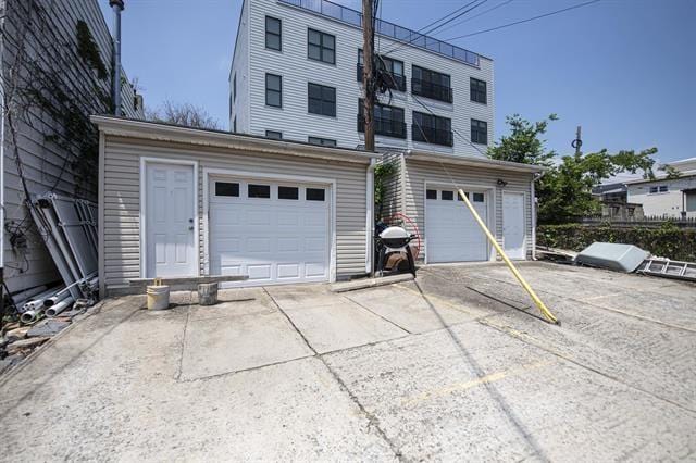 296 Paterson Plank Rd, Jersey City, NJ 07307 - garage with concrete driveway