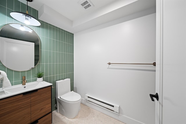 20 Storms Ave Unit 1A, Jersey City, NJ 07306 - bathroom with a baseboard radiator, tile walls, vanity, toilet, and baseboards