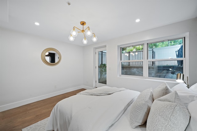 20 Storms Ave Unit 1A, Jersey City, NJ 07306 - bedroom featuring wood finished floors, baseboards, a chandelier, and recessed lighting