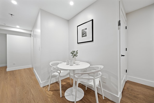 20 Storms Ave Unit 1A, Jersey City, NJ 07306 - dining area featuring light wood finished floors, baseboards, and recessed lighting