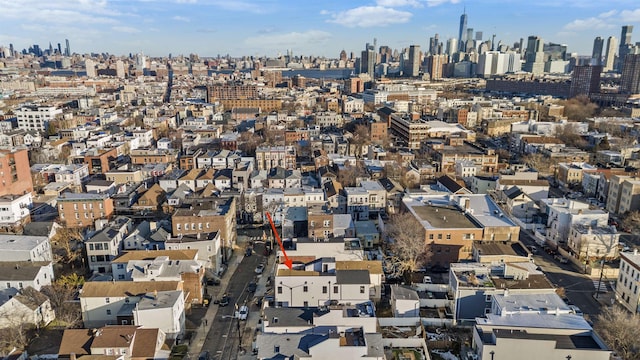 aerial view of property's location with a view of skyline