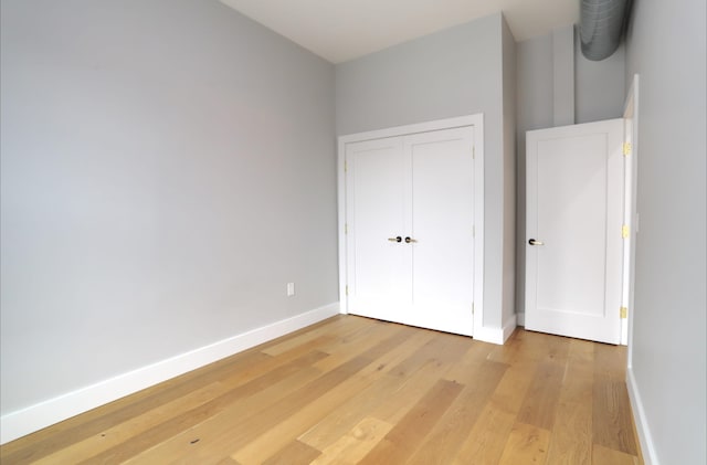 unfurnished bedroom with light hardwood / wood-style flooring