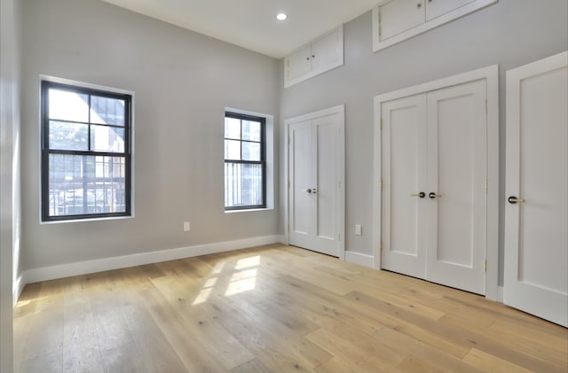 unfurnished bedroom featuring light hardwood / wood-style flooring