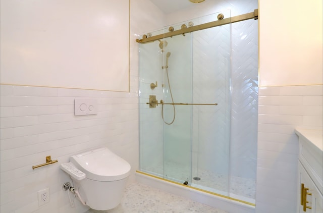 bathroom featuring tile walls, vanity, toilet, and walk in shower