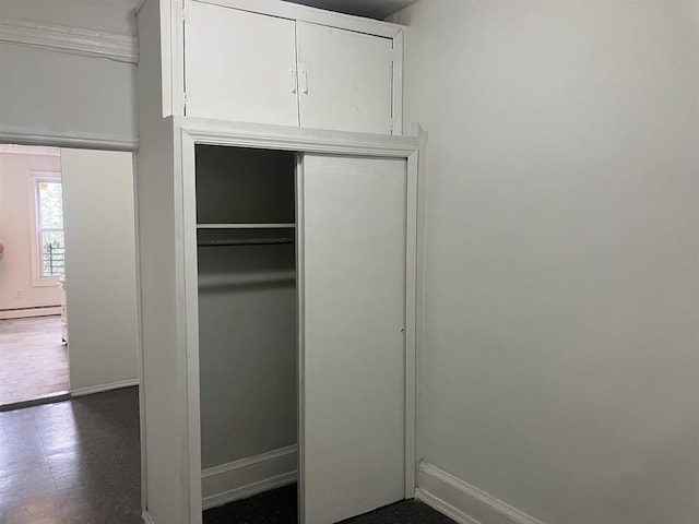 closet featuring a baseboard radiator