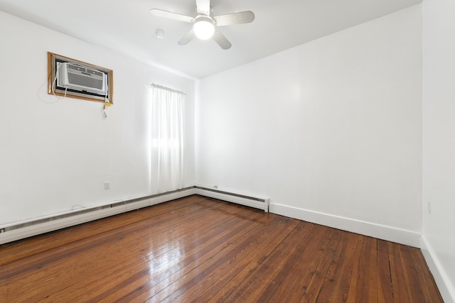 empty room featuring a wall mounted AC, hardwood / wood-style floors, and ceiling fan