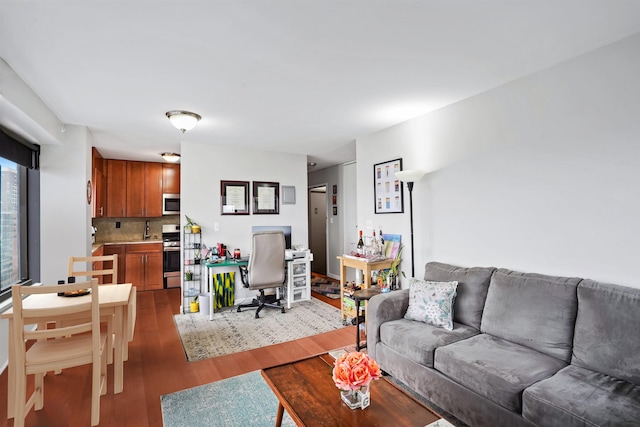 living room featuring dark wood-type flooring