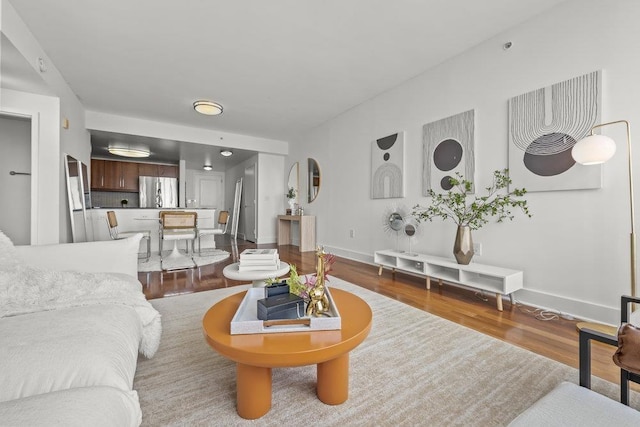 88 Morgan St Unit 4306, Jersey City, NJ 07302 - living area with baseboards and wood finished floors