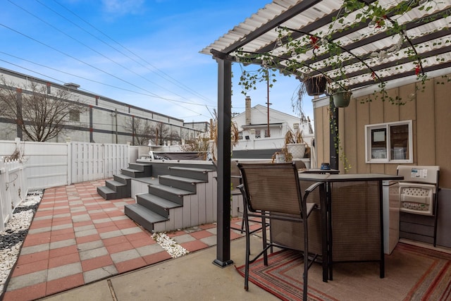 view of patio / terrace featuring a pergola