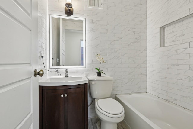 full bath with toilet and vanity