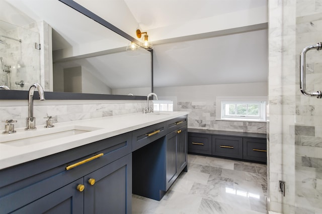 full bath with double vanity, a stall shower, and a sink