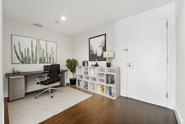 home office with visible vents, baseboards, recessed lighting, and wood finished floors