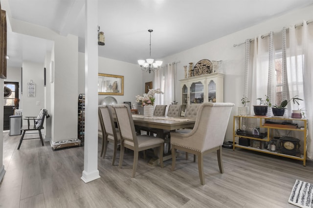 4319 Cottage Ave, North Bergen, NJ 07047 - dining space with a chandelier and wood finished floors