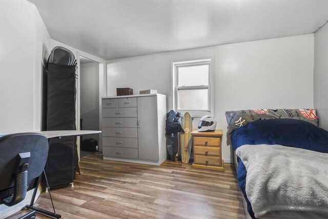 4319 Cottage Ave, North Bergen, NJ 07047 - bedroom with wood finished floors and a desk
