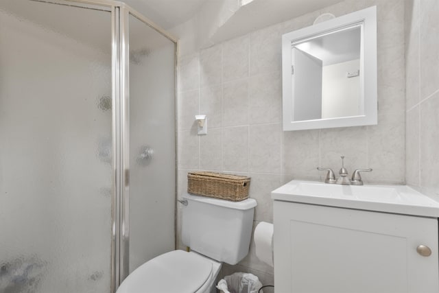 4319 Cottage Ave, North Bergen, NJ 07047 - full bath featuring vanity, tile walls, and a stall shower