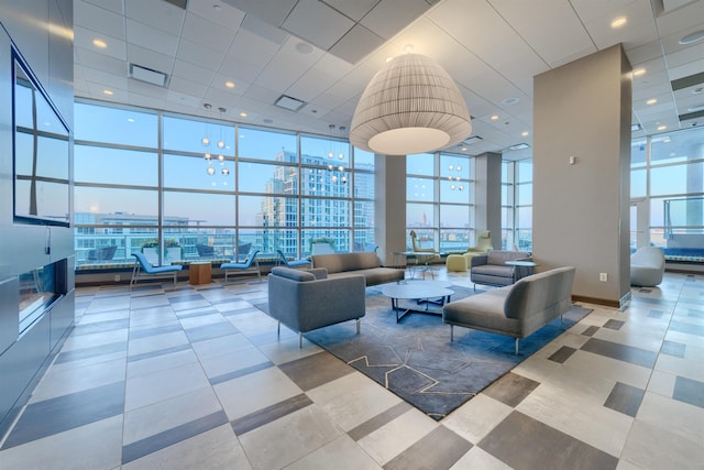 lobby with visible vents and a city view