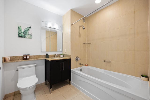 bathroom with  shower combination, tile patterned flooring, toilet, and vanity