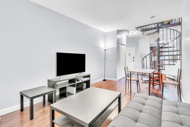 294 Barrow St Unit 6, Jersey City, NJ 07302 - living room with stairway and wood finished floors
