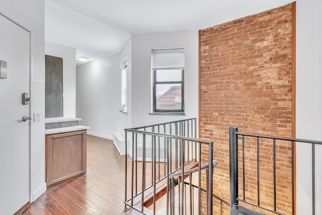 294 Barrow St Unit 6, Jersey City, NJ 07302 - corridor featuring an upstairs landing and hardwood / wood-style floors